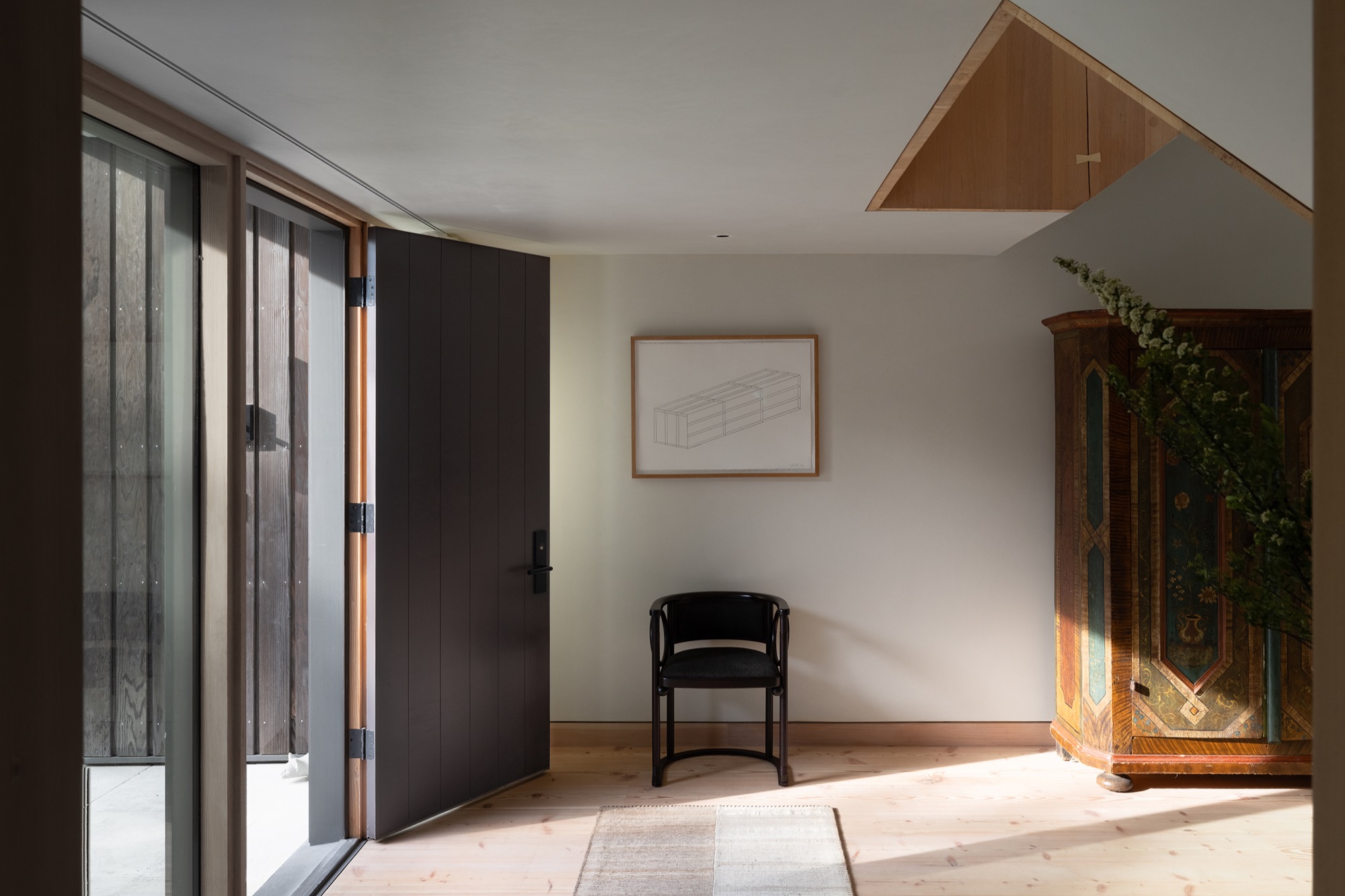 Hillside House entry with Douglas fir finishes in West Lake Hills, Texas