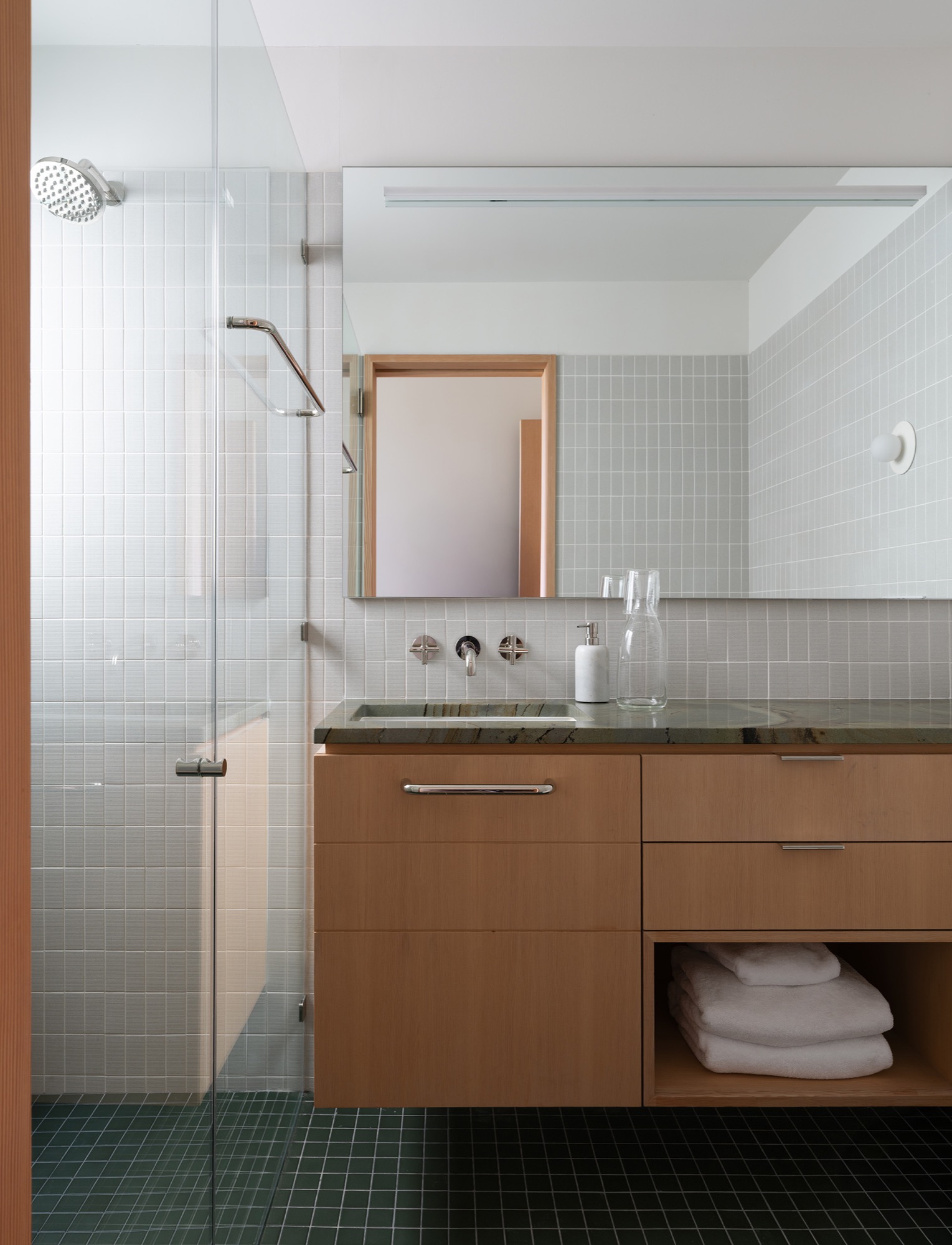 Hillside House bathroom with floating vanity in West Lake Hills, Texas