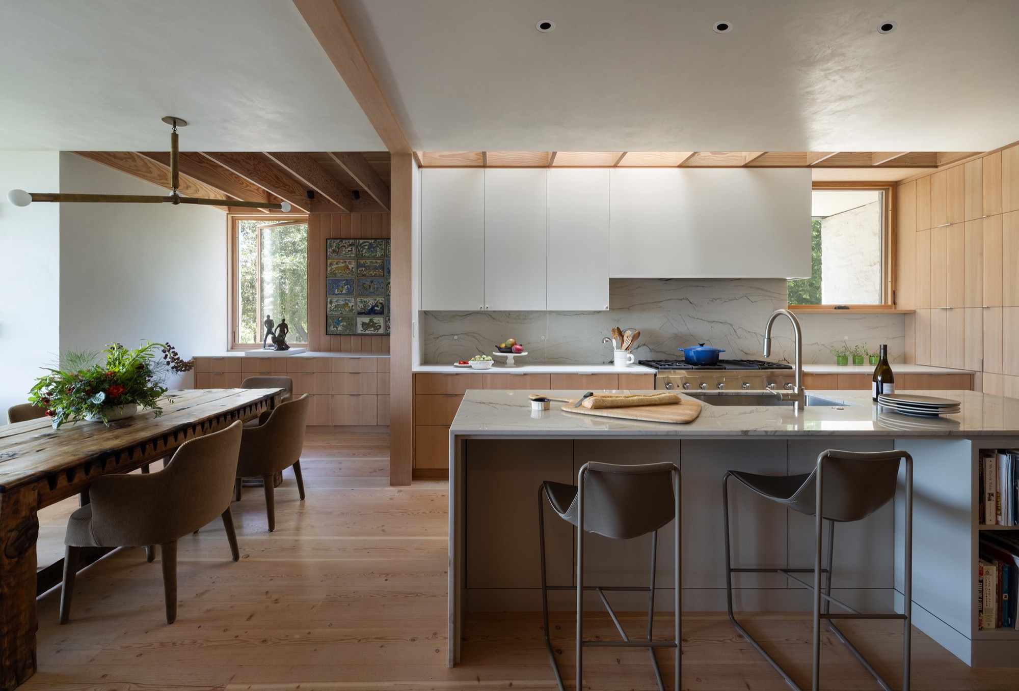 Hillside House kitchen with skylight in West Lake Hills, Texas